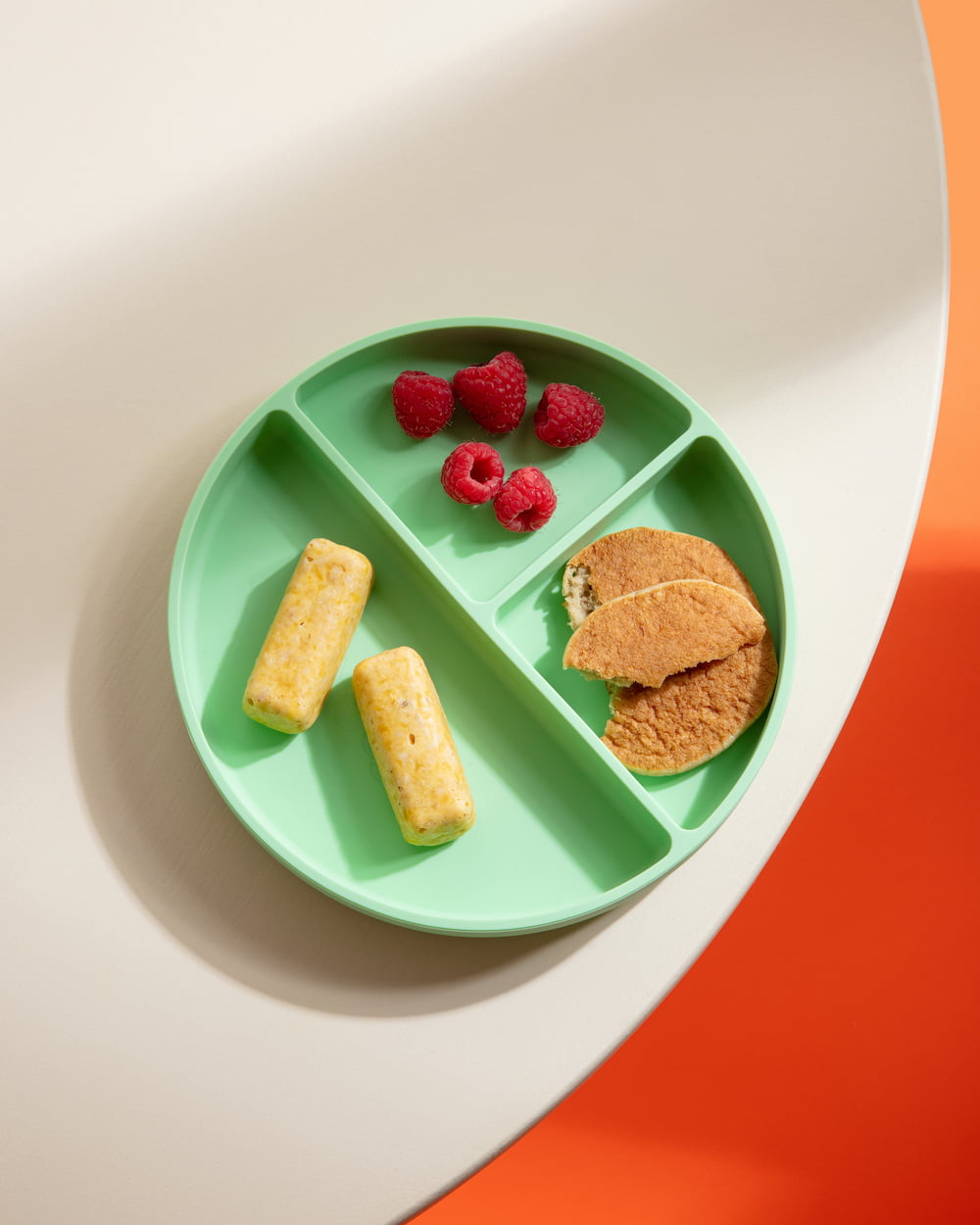 Assiette compartimentée ronde à ventouse verte pastel